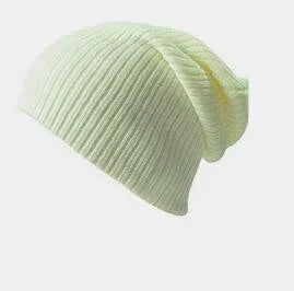 Soft white ribbed knit beanie hat isolated on light background