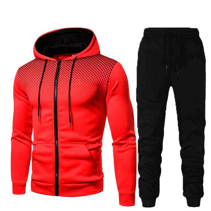 Men's red zip-up hoodie with black dotted pattern and black drawstring jogger pants