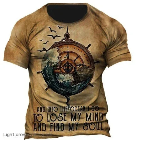 Light brown t-shirt with ocean and ship wheel design, birds, and quote about finding soul
