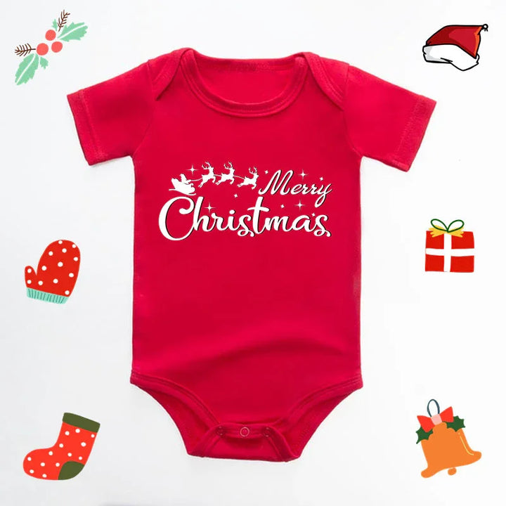 Red baby onesie with white Merry Christmas text and Santa sleigh graphic surrounded by holiday icons