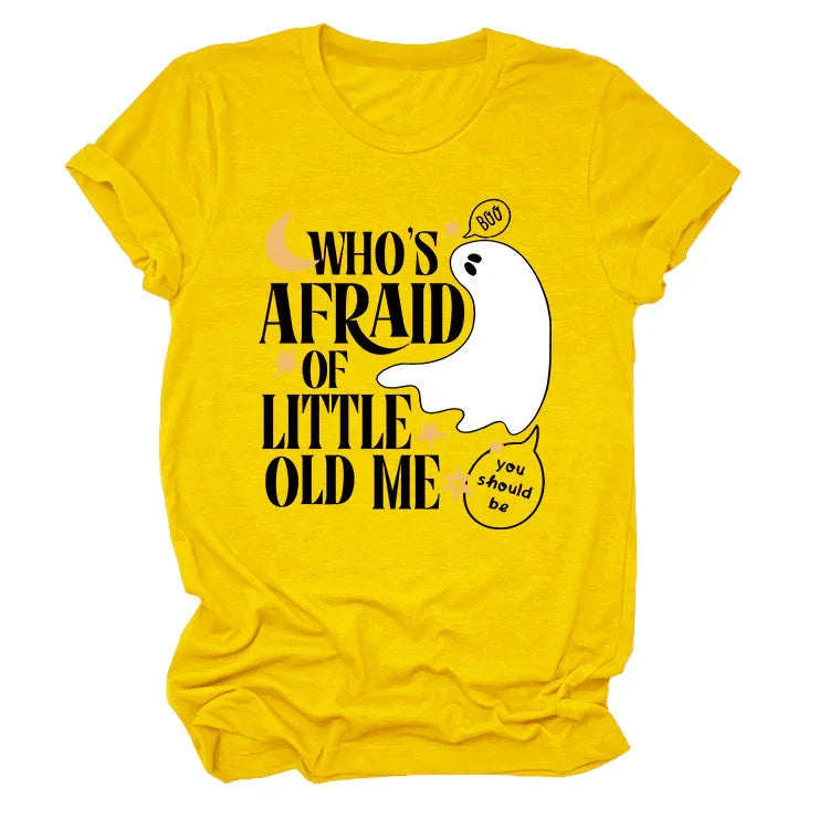 Yellow t-shirt with a white ghost and text saying Who's Afraid of Little Old Me with speech bubbles saying Boo and You Should Be