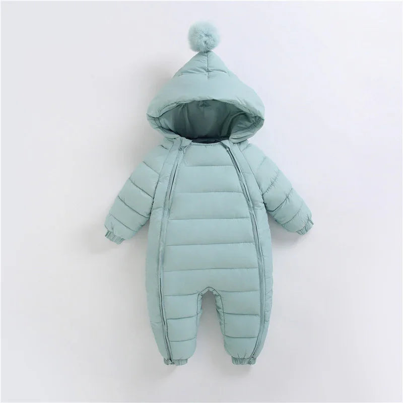 Light blue padded baby snowsuit with hood and pom pom on a white background