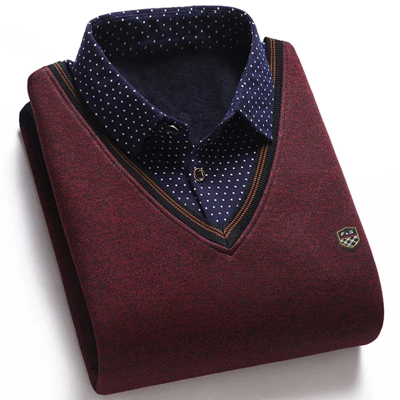 Folded maroon V-neck sweater with black and orange trim over navy blue polka dot dress shirt