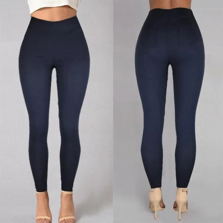 Front and back view of woman wearing high-waisted navy blue leggings with pockets, paired with beige high heels