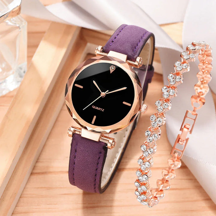 Elegant rose gold quartz watch with purple leather strap next to sparkling rhinestone bracelet on wooden surface