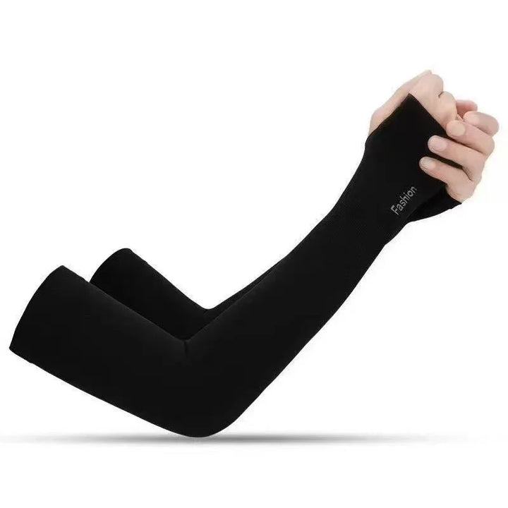 Black compression arm sleeves with thumb hole worn on raised arms, featuring subtle 'Fashion' text