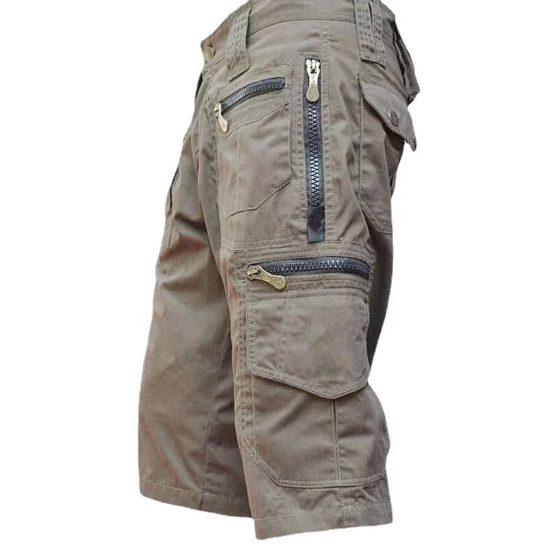 Brown cargo shorts with multiple zippered pockets and durable stitching