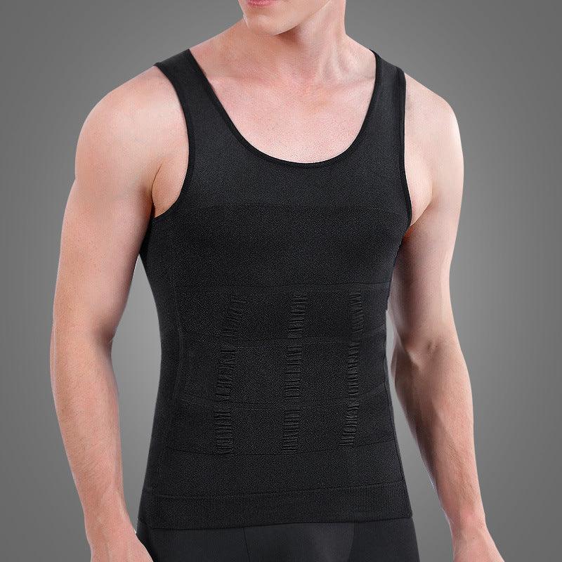 male model wearing black compression tank top with textured abdominal design on gray background