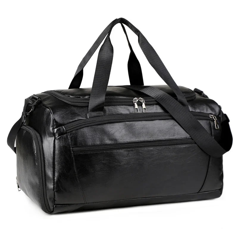 Black leather gym duffel bag with multiple zippered compartments and adjustable shoulder strap