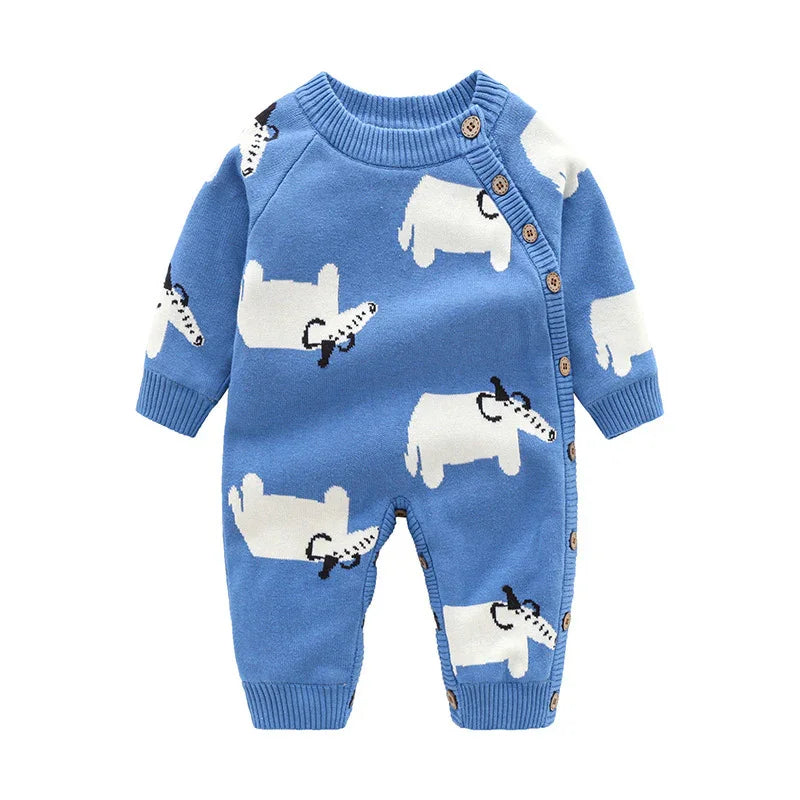 Blue baby romper with white dog patterns and button closure on front and sleeve cuffs
