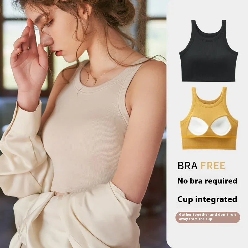 Woman wearing beige ribbed sleeveless bra-free top with integrated cup, black and yellow tops shown