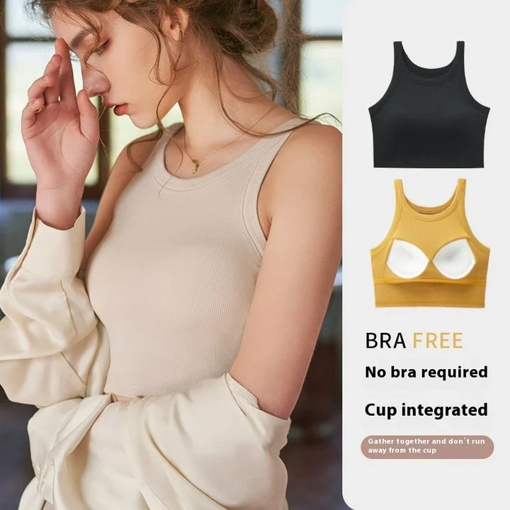 Woman wearing beige ribbed sleeveless bra-free top with integrated cup, black and yellow tops shown