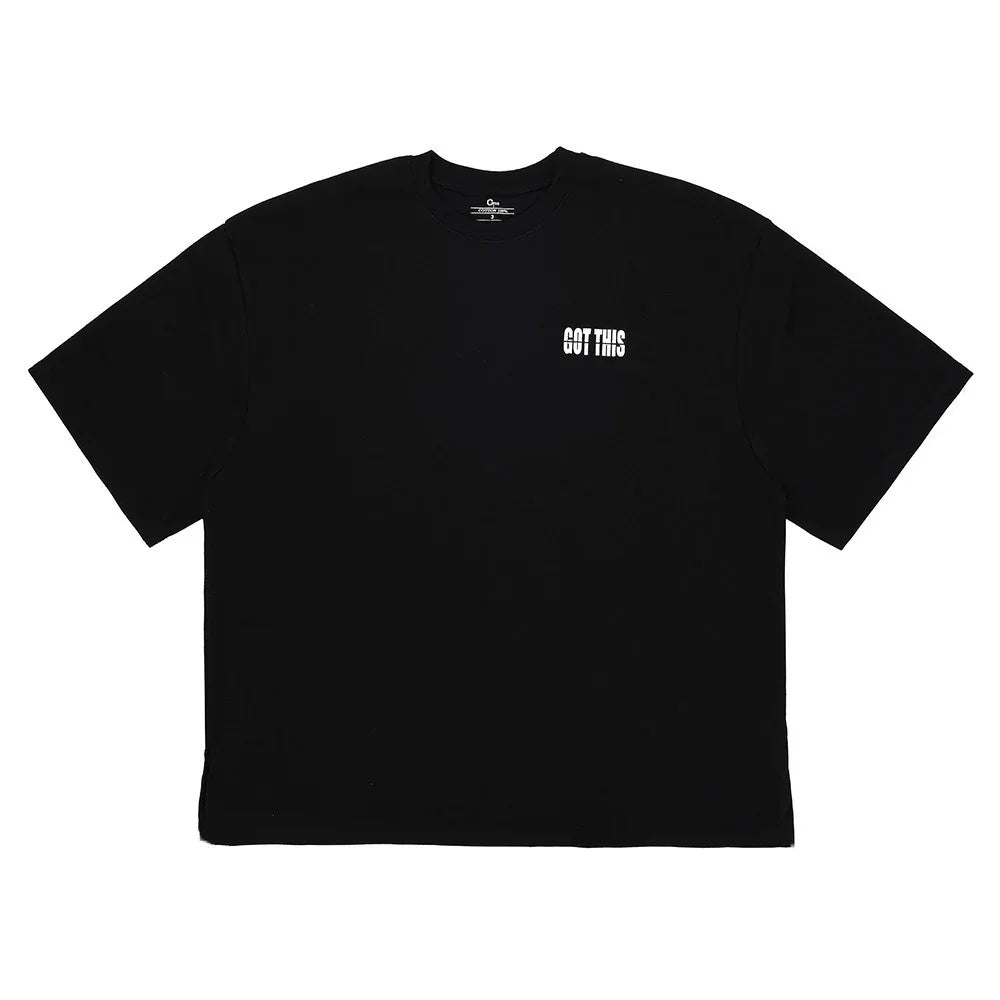 Black oversized t-shirt with small white text 'GOT THIS' on chest