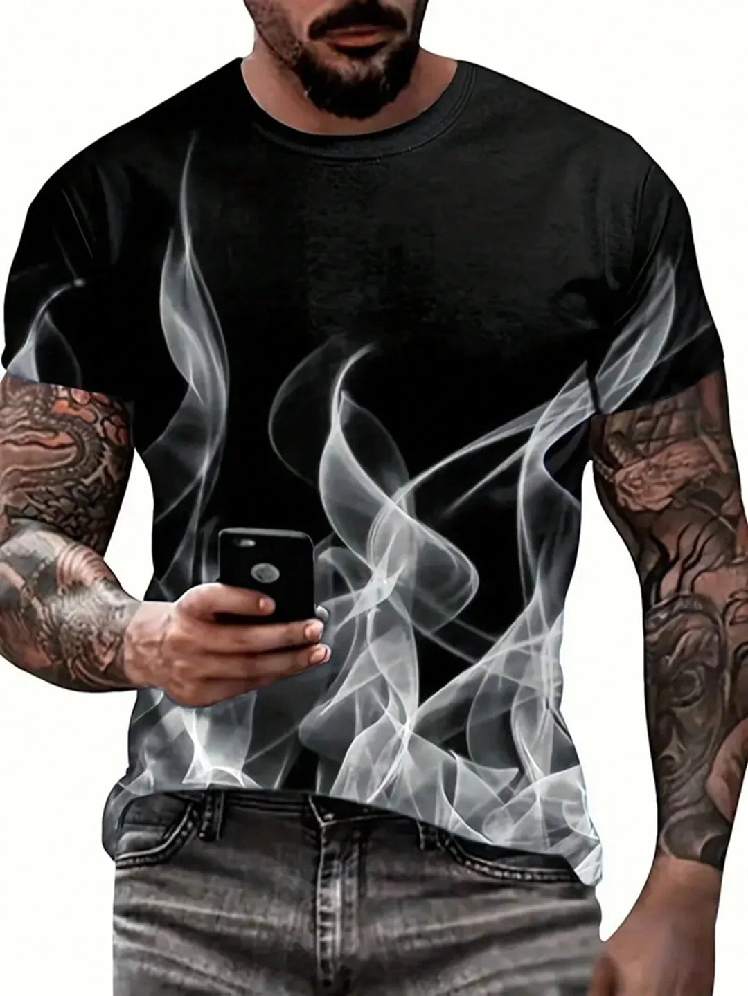 Man wearing black t-shirt with white smoke design and tattooed arms holding smartphone
