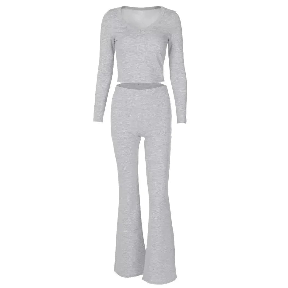 Light grey ribbed knit two-piece set with long sleeve crop top and flared pants