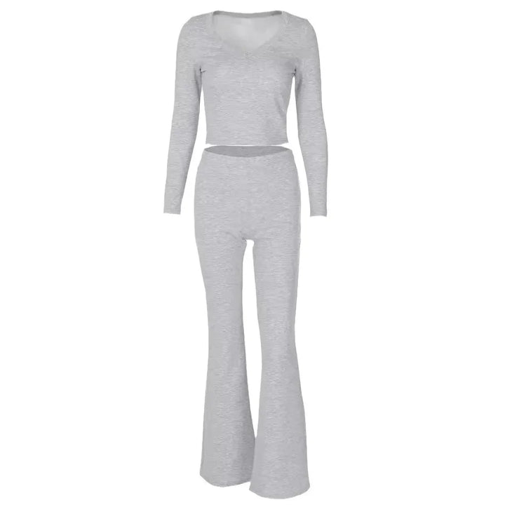 Light grey ribbed knit two-piece set with long sleeve crop top and flared pants