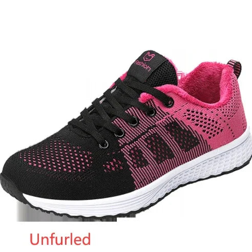 Black and pink knitted athletic sneaker with white sole and lace-up closure
