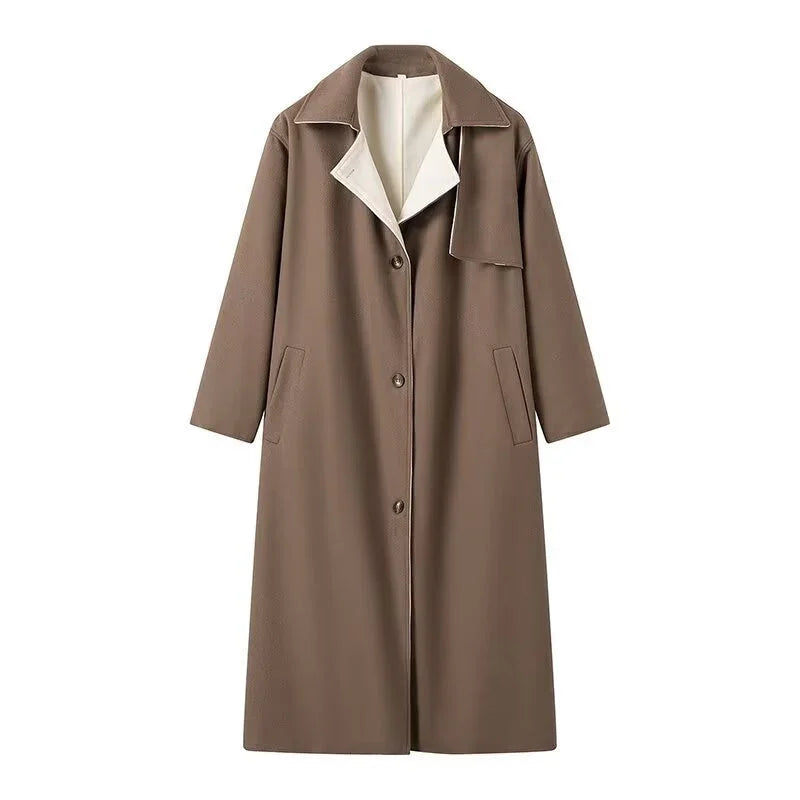 Long brown wool blend coat with lapel collar, button closure, side pockets, and white inner lining