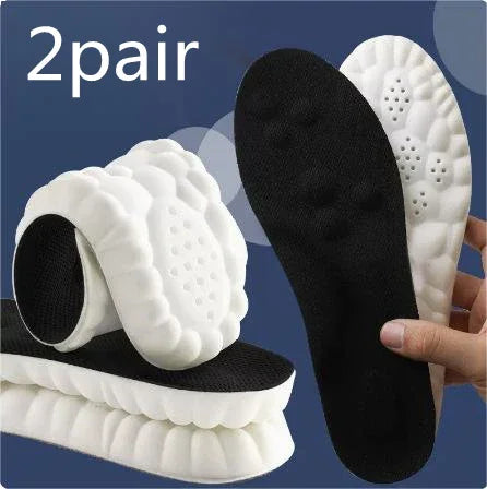 2 pairs of thick white and black shoe insoles with cushioned honeycomb design, close-up