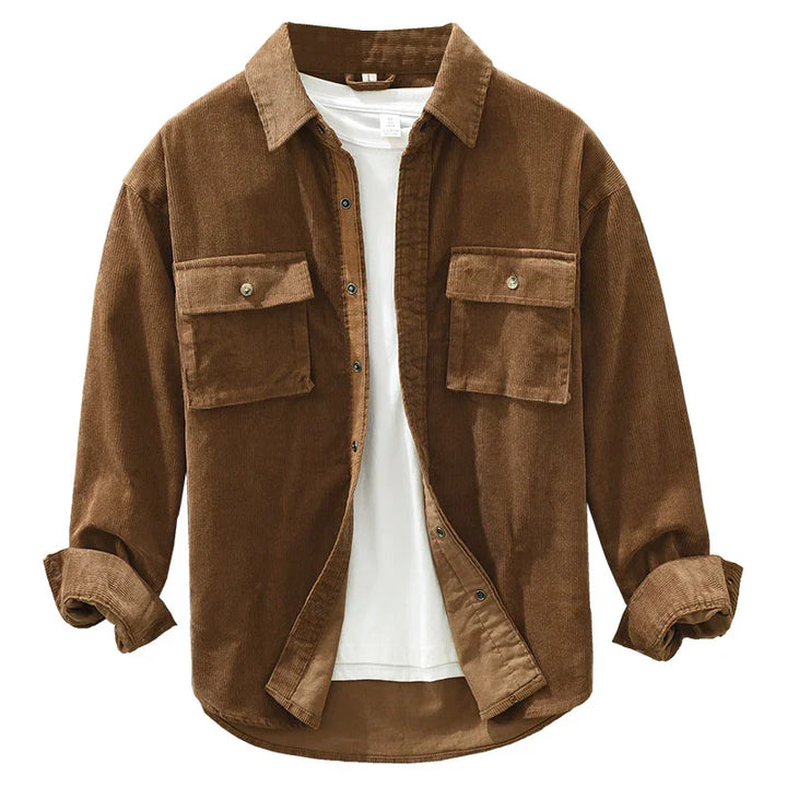 Brown corduroy shirt jacket with buttoned chest pockets over a white T-shirt