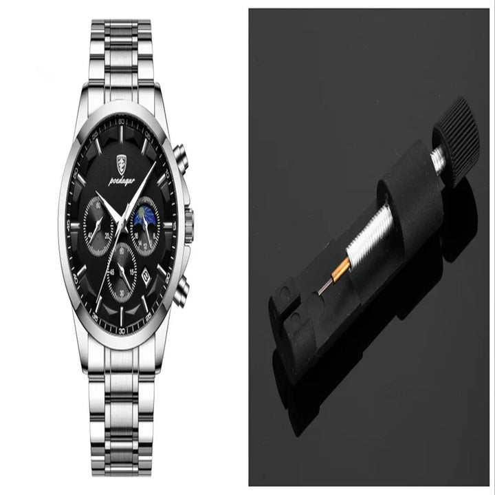 Silver stainless steel luxury men's wristwatch with black dial and chronograph alongside watch spring bar removal tool
