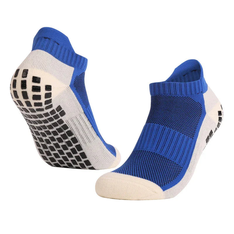 Blue and white non-slip ankle socks with black grip dots on soles