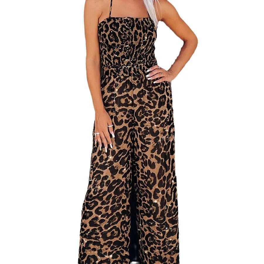 Woman wearing sleeveless leopard print maxi dress with wide legs and thin straps