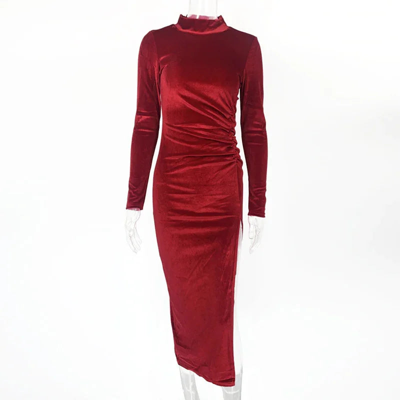 Elegant long-sleeve red velvet midi dress with ruched side detail on a mannequin
