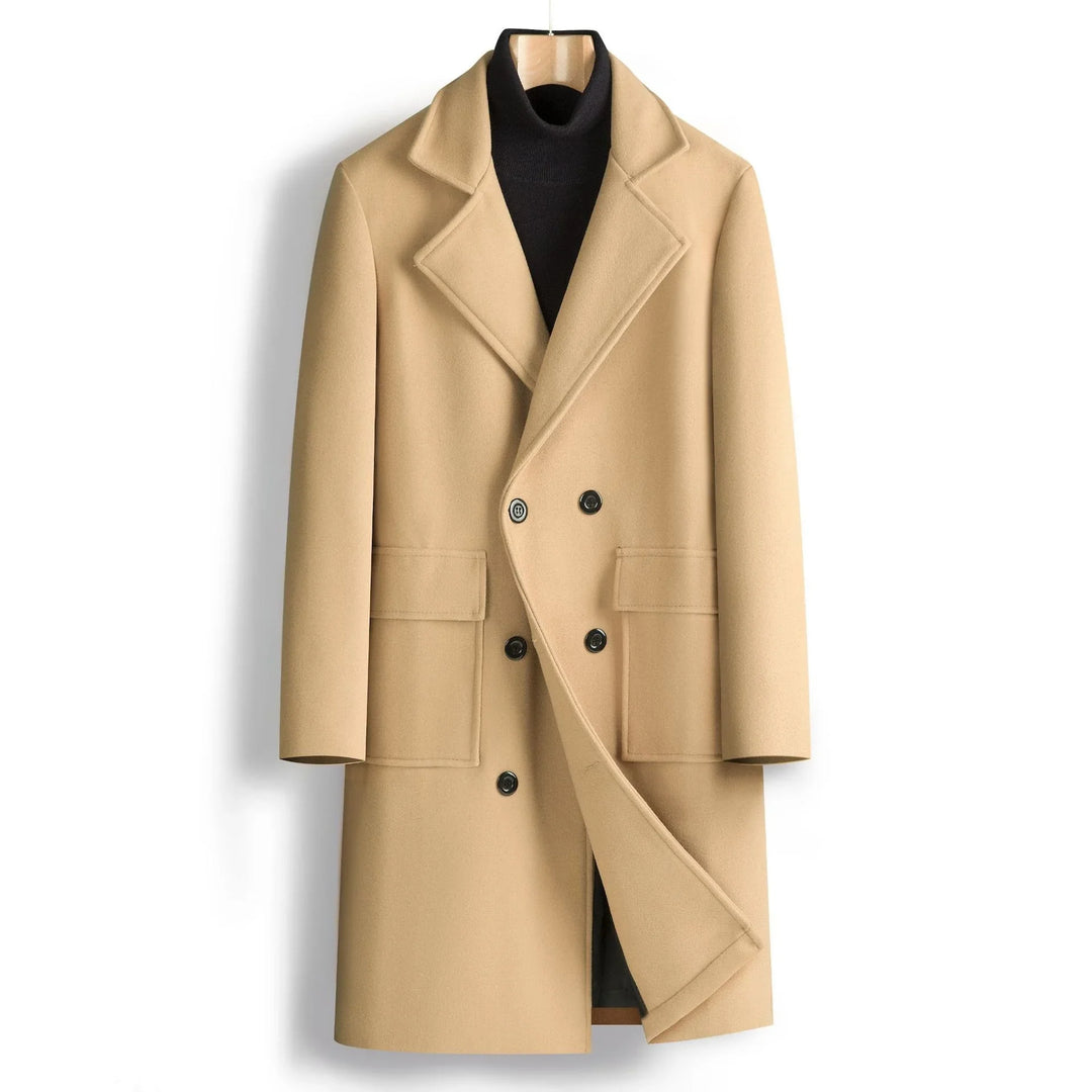Beige double-breasted wool coat with black buttons over black turtleneck on wooden hanger