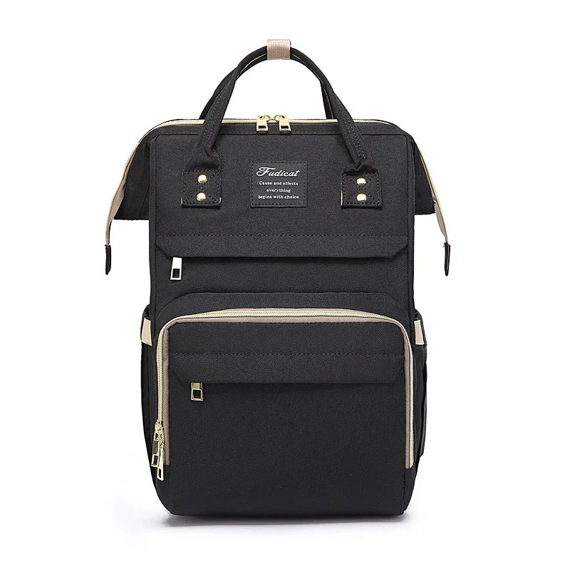 black rectangular backpack with beige zipper accents and dual top handles, front pockets, and a small logo patch