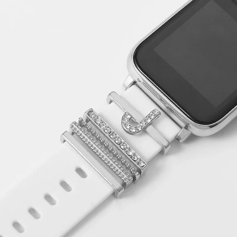 White smartwatch band with silver and rhinestone embellishments on white background