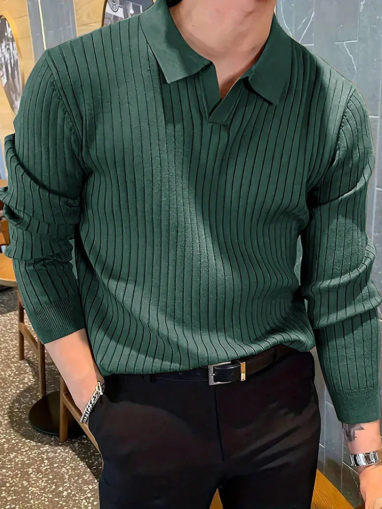 Man wearing green ribbed long-sleeve polo sweater paired with black pants and silver watch