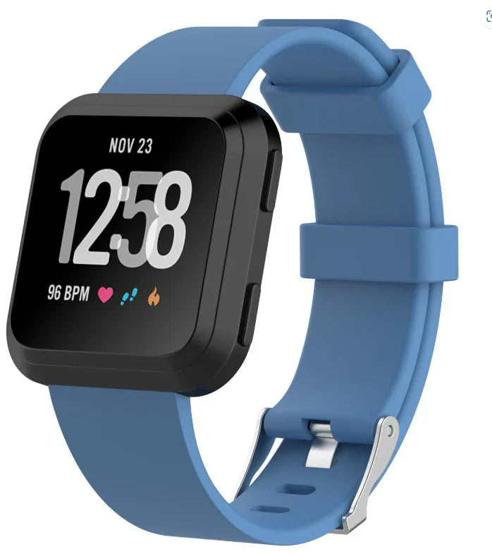 Black square smartwatch with blue silicone band showing time, date, heart rate, steps, and calories
