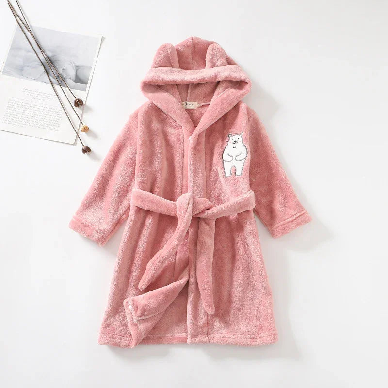 Soft pink children's hooded bathrobe with bear ears and white bear patch on chest