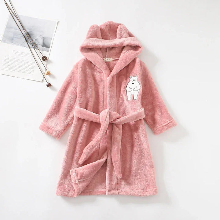 Soft pink children's hooded bathrobe with bear ears and white bear patch on chest
