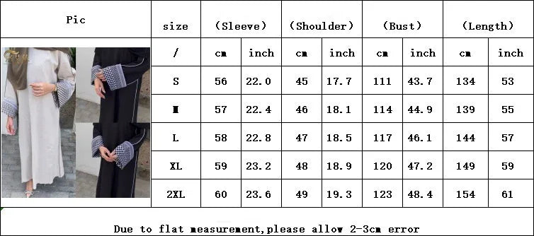 size chart for women's long sleeve dresses with patterned wide cuffs in black and beige colors