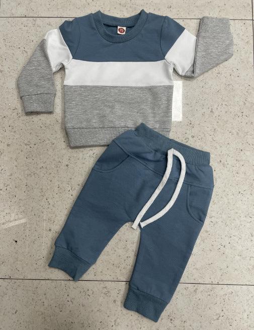 Toddler outfit with blue, white, and gray long-sleeve sweatshirt and blue pants with white drawstring