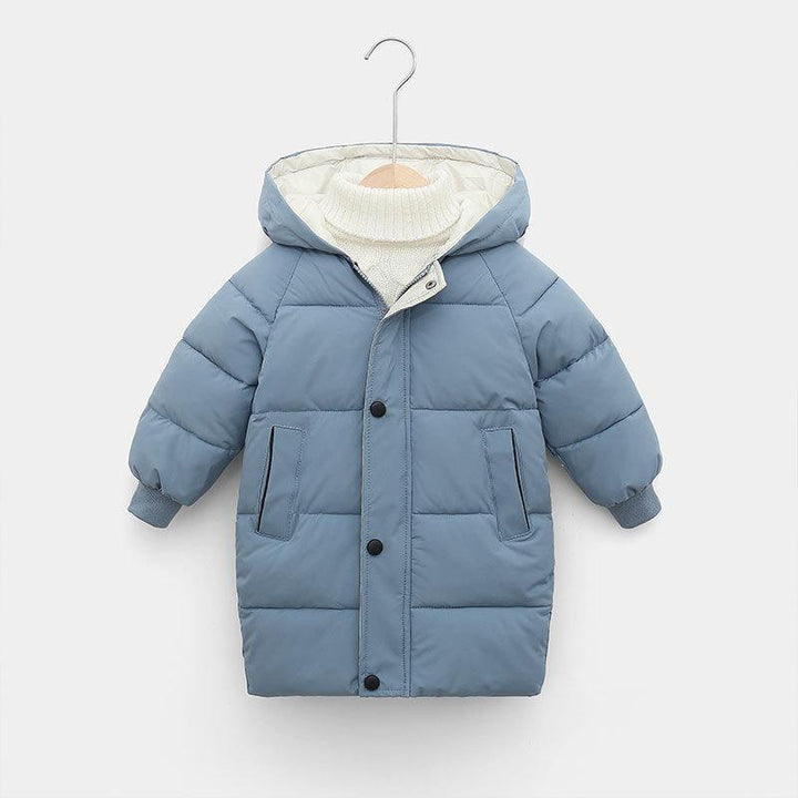 Blue padded kids winter coat with hood and white knit sweater on hanger against gray background