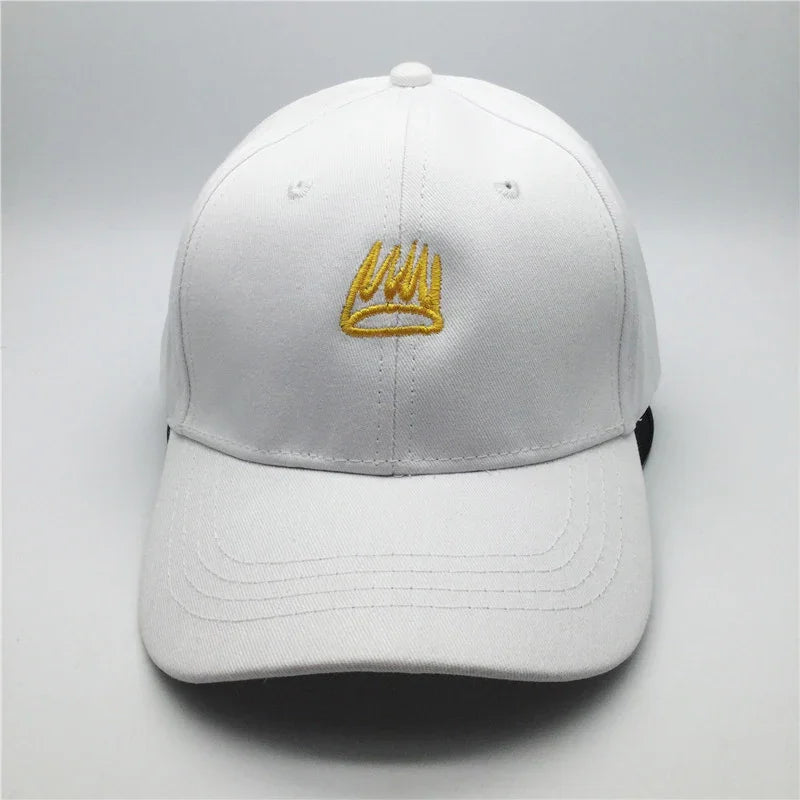 White baseball cap with yellow stitched crown logo on the front panel