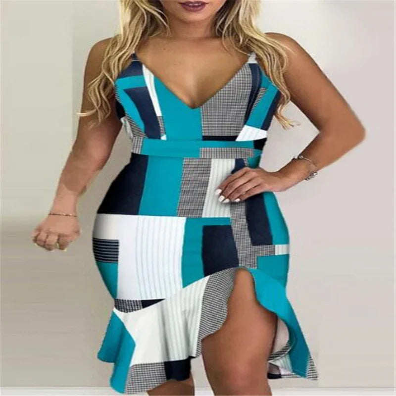 Woman wearing teal, white, and black geometric print sleeveless dress with a thigh-high ruffle slit