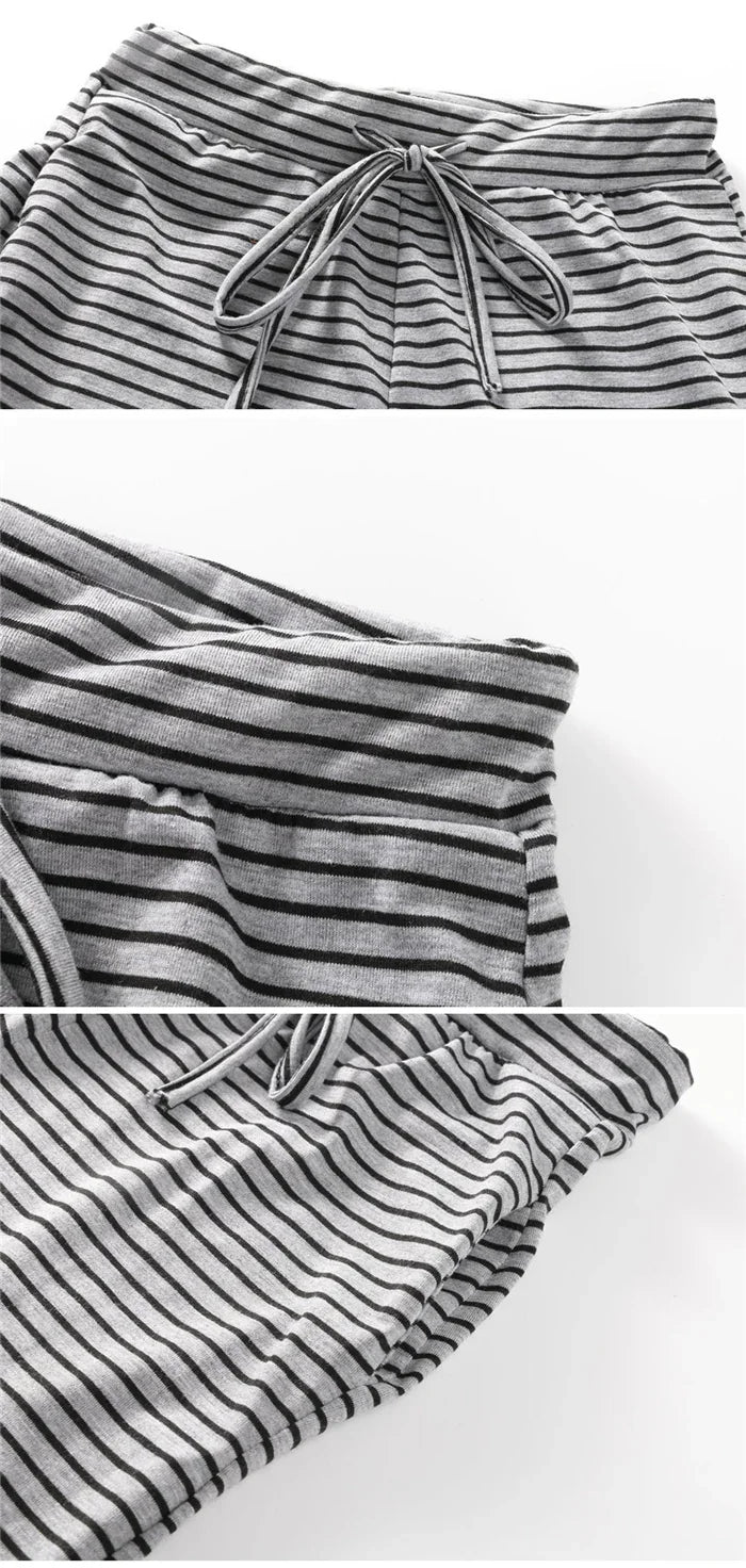 Close-up views of gray and black striped casual pants with drawstring waistband