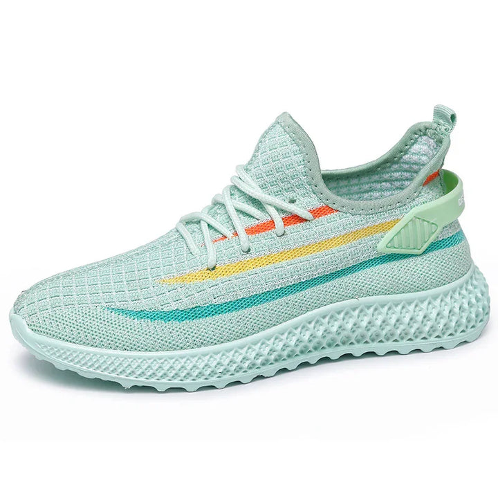 Light green breathable mesh sneaker with colorful stripes and textured sole, athletic shoe design