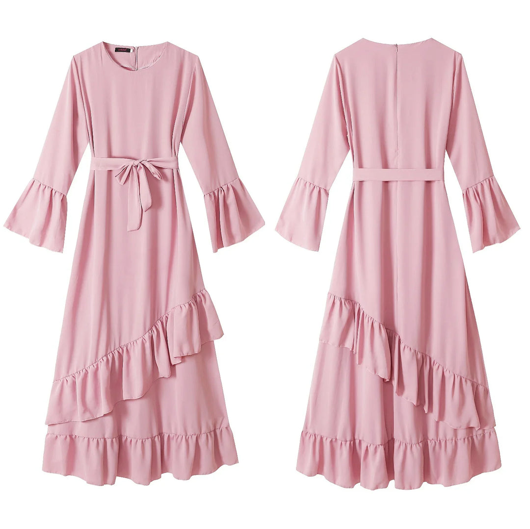 Front and back view of a pink midi dress with flared sleeves, waist tie, and ruffle hem