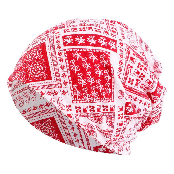 Red and white bandana print slouchy beanie hat with floral and paisley patterns