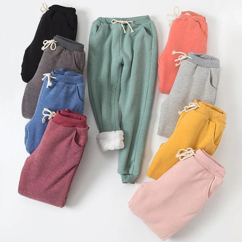 Colorful cozy fleece-lined sweatpants with drawstrings in black, gray, blue, maroon, green, coral, light gray, yellow, and pink