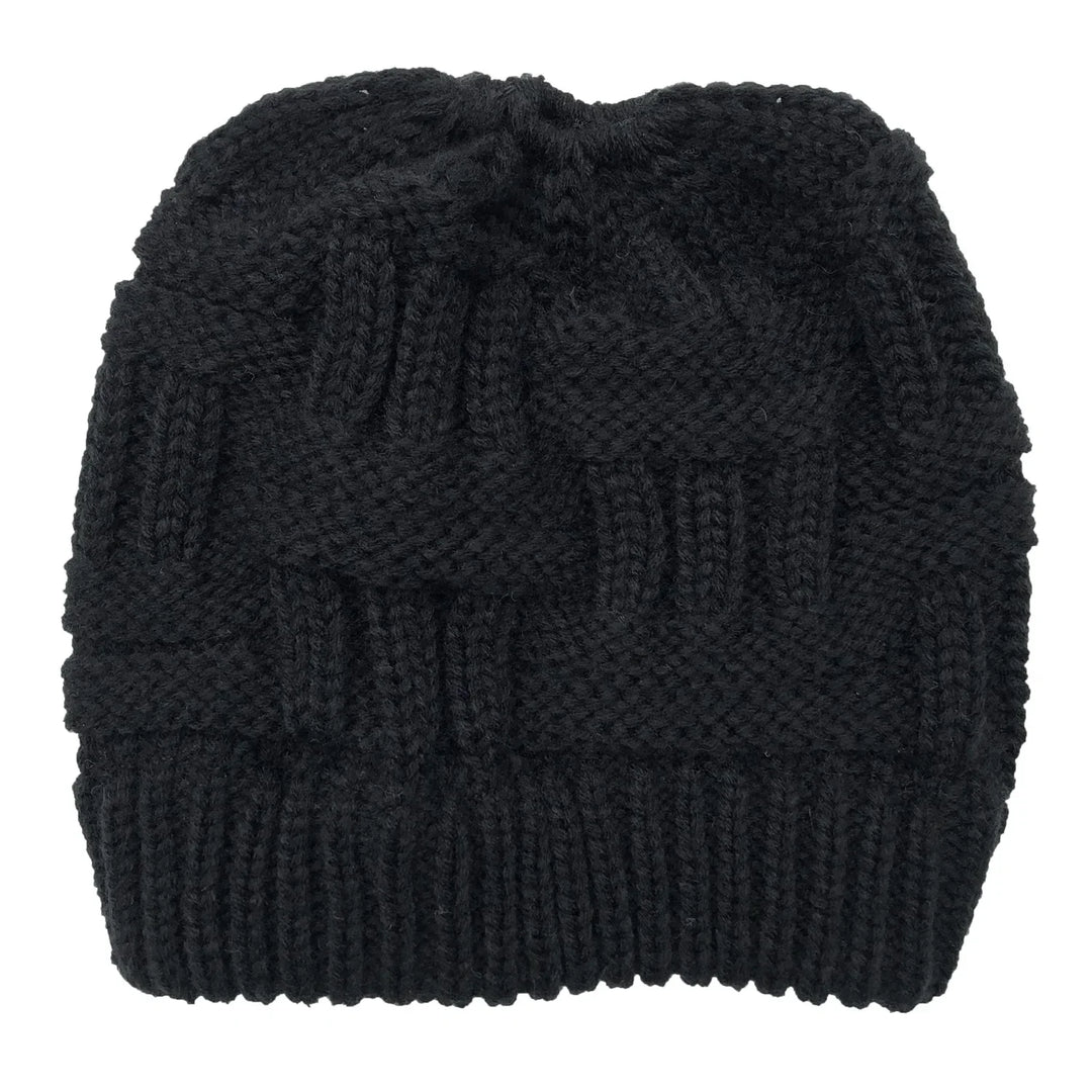 Black knitted winter beanie hat with a woven cable pattern and ribbed brim