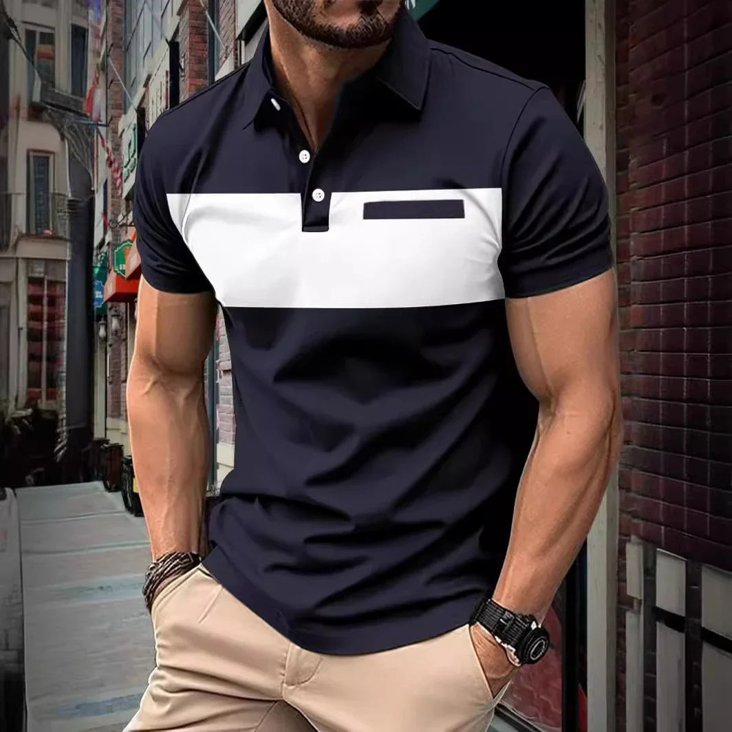 Muscular man wearing stylish black and white color block polo shirt and beige pants, urban street background