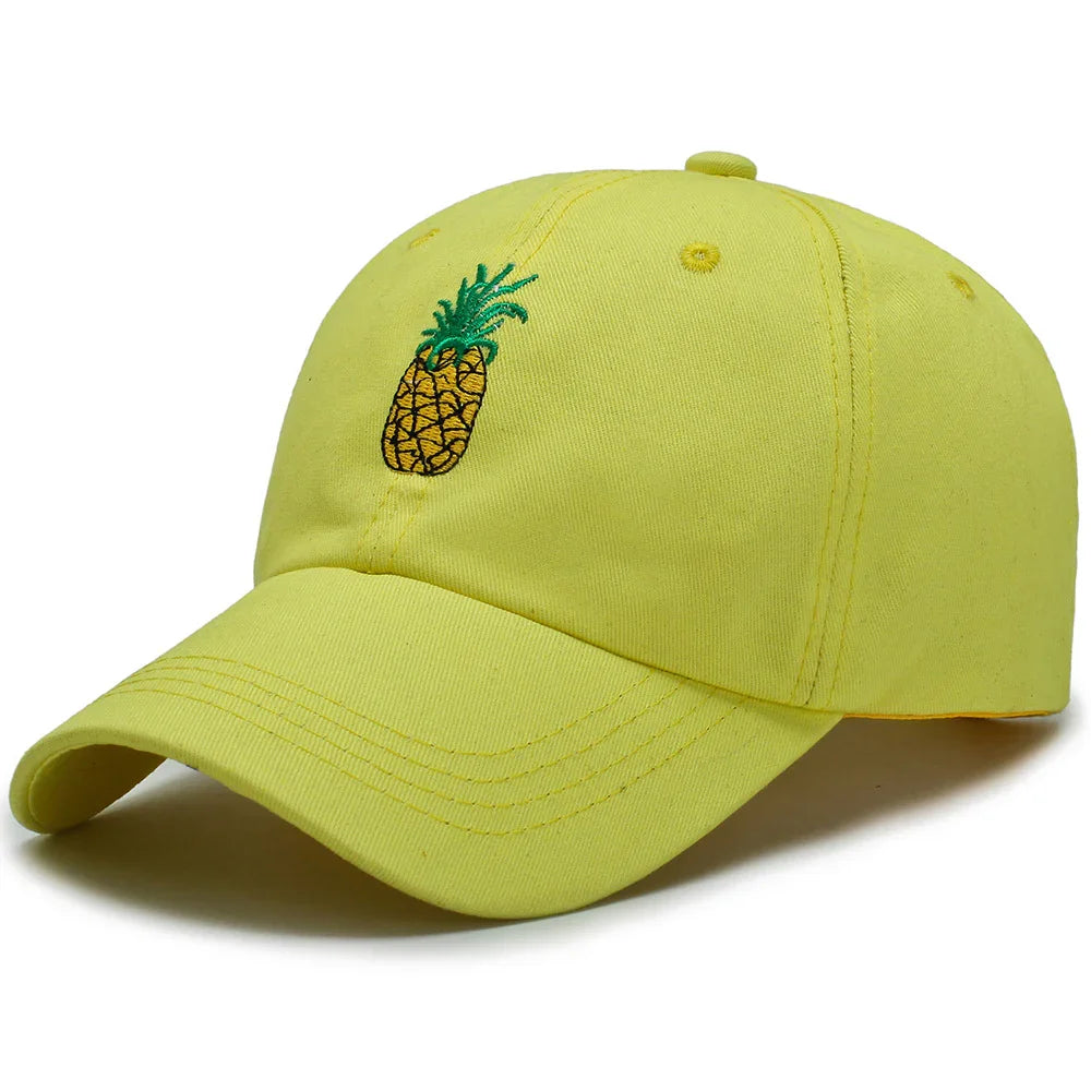 Yellow baseball cap with embroidered green and yellow pineapple design on front