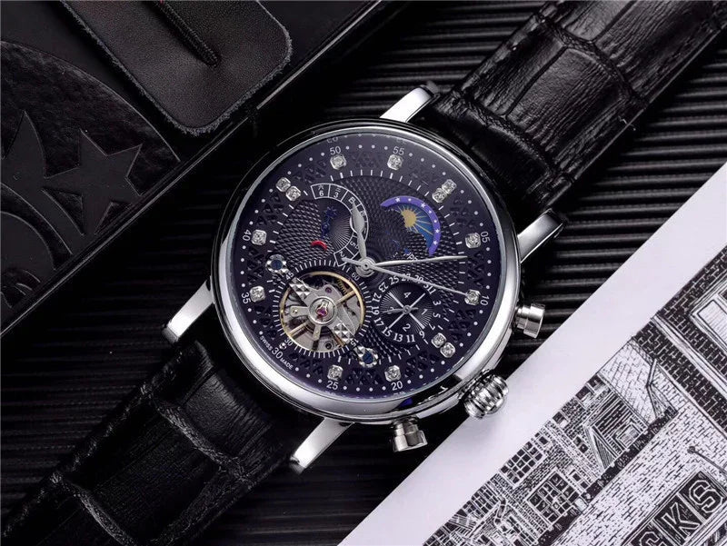 Luxury men's wristwatch with black leather strap, blue dial, diamond markers, and moon phase complication