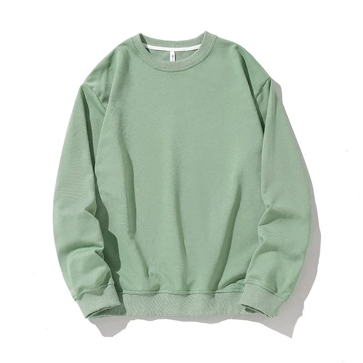 Light green long sleeve crewneck sweatshirt made of soft fabric on white background